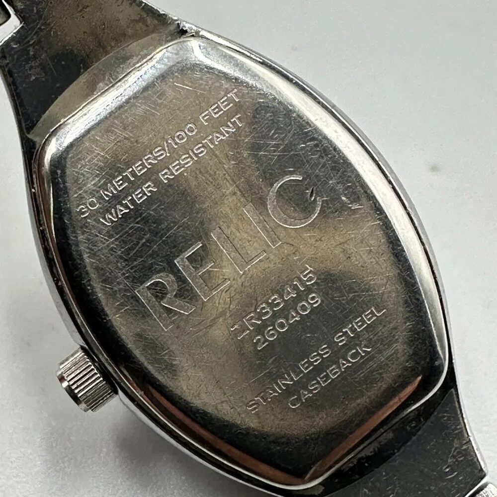 3/$30 Relic Folio Watch Women Silver Tone Blue Dial Barrel Case ZR33415
